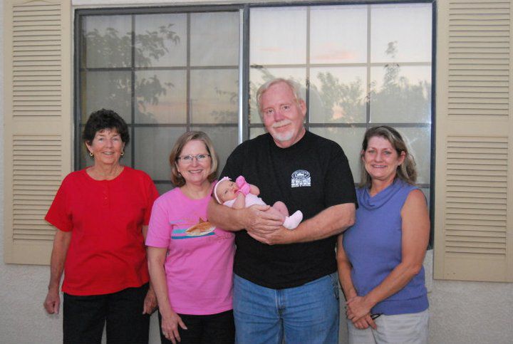 Victoria builder Rex Horst with granddaughter and family